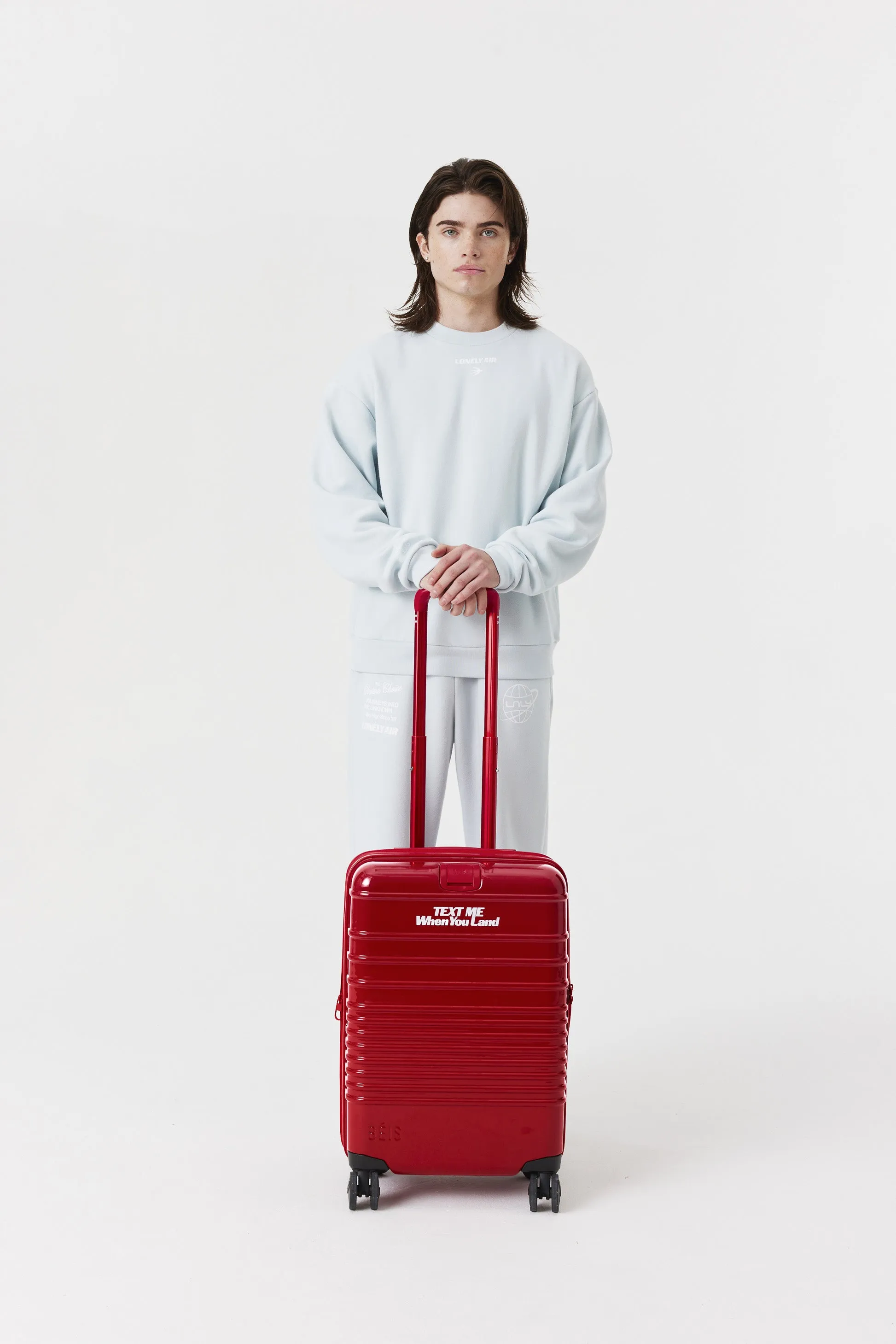 The Carry-On Roller in Text Me Red