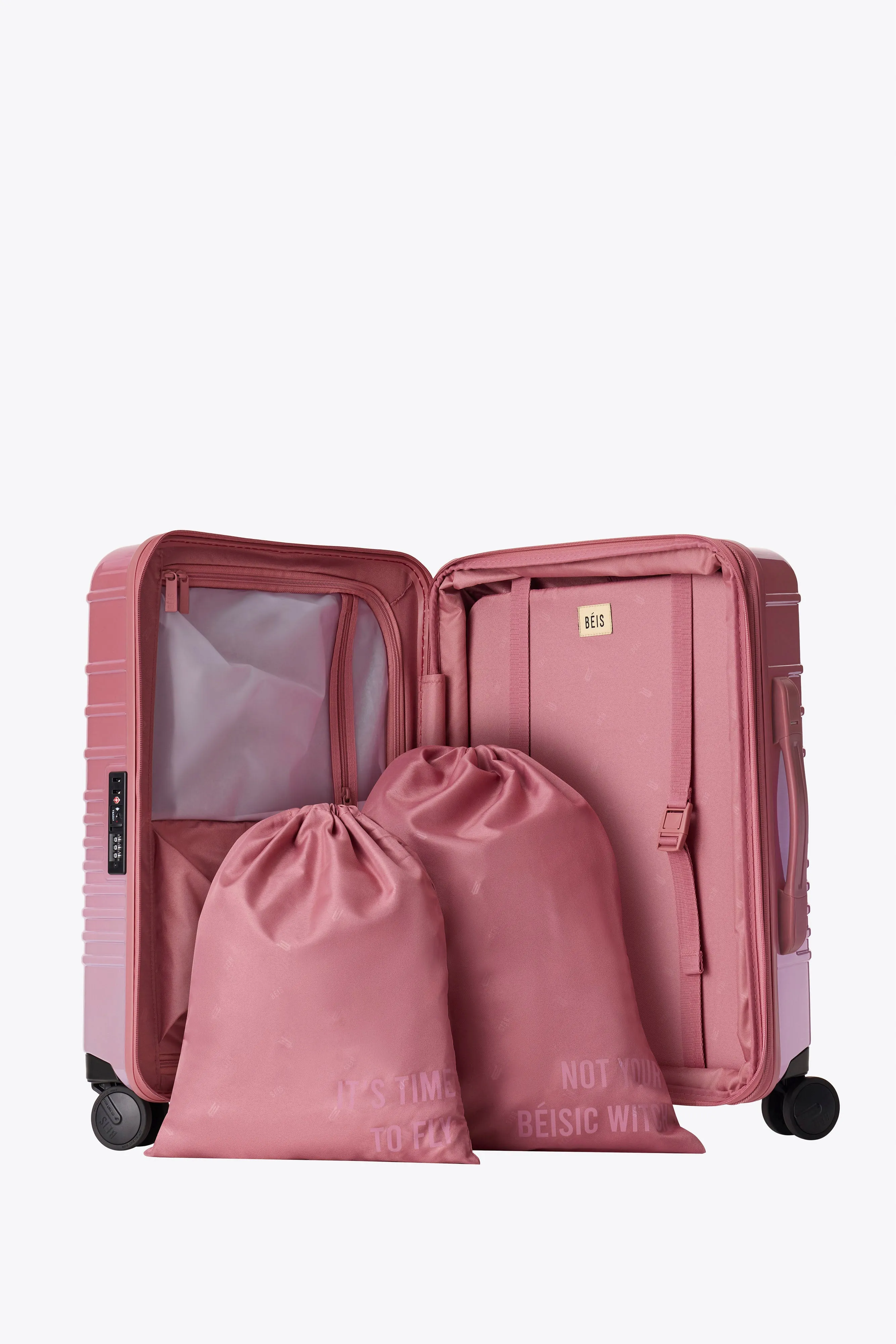 The Carry-On Roller in Wicked Pink