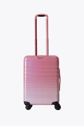 The Carry-On Roller in Wicked Pink