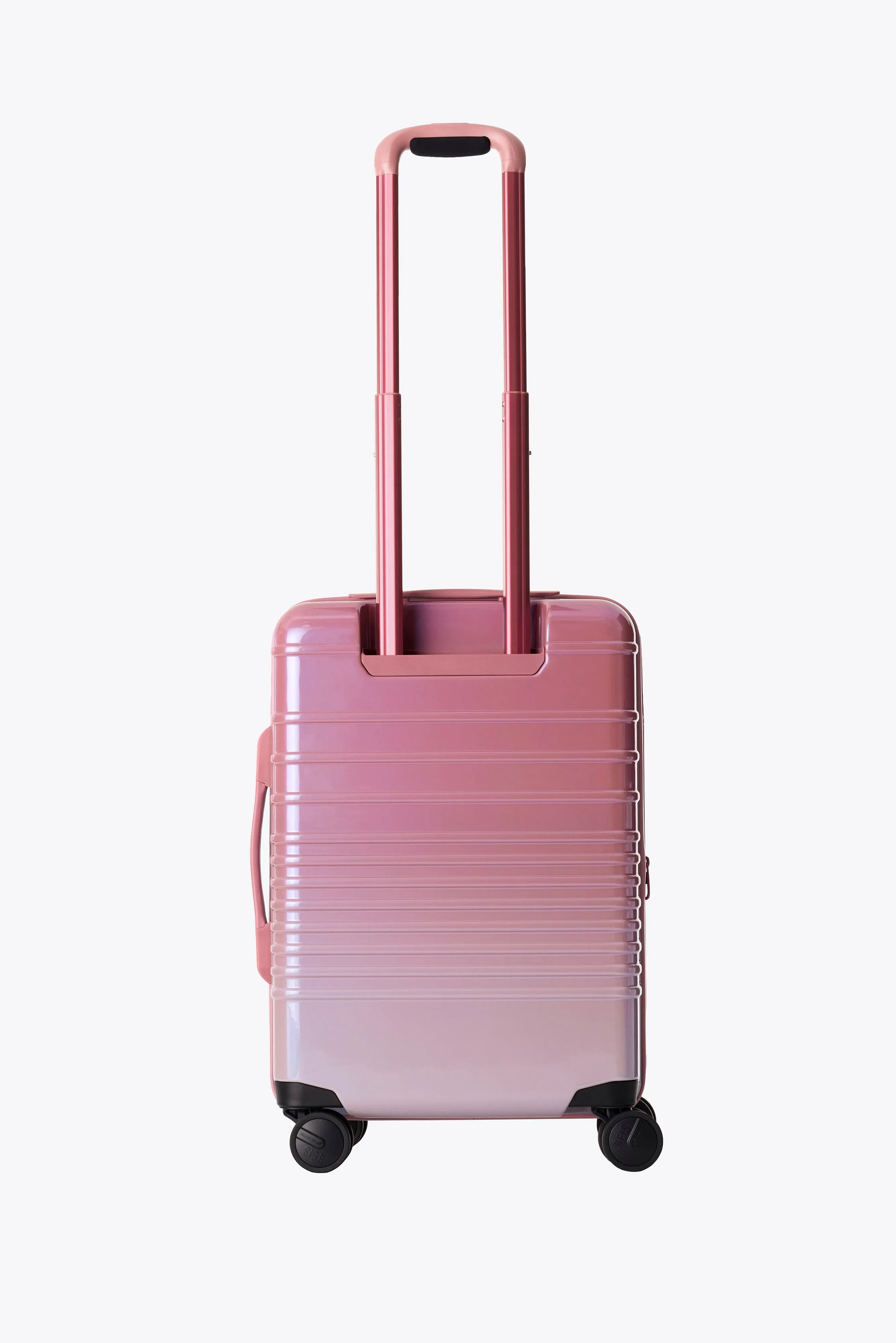 The Carry-On Roller in Wicked Pink