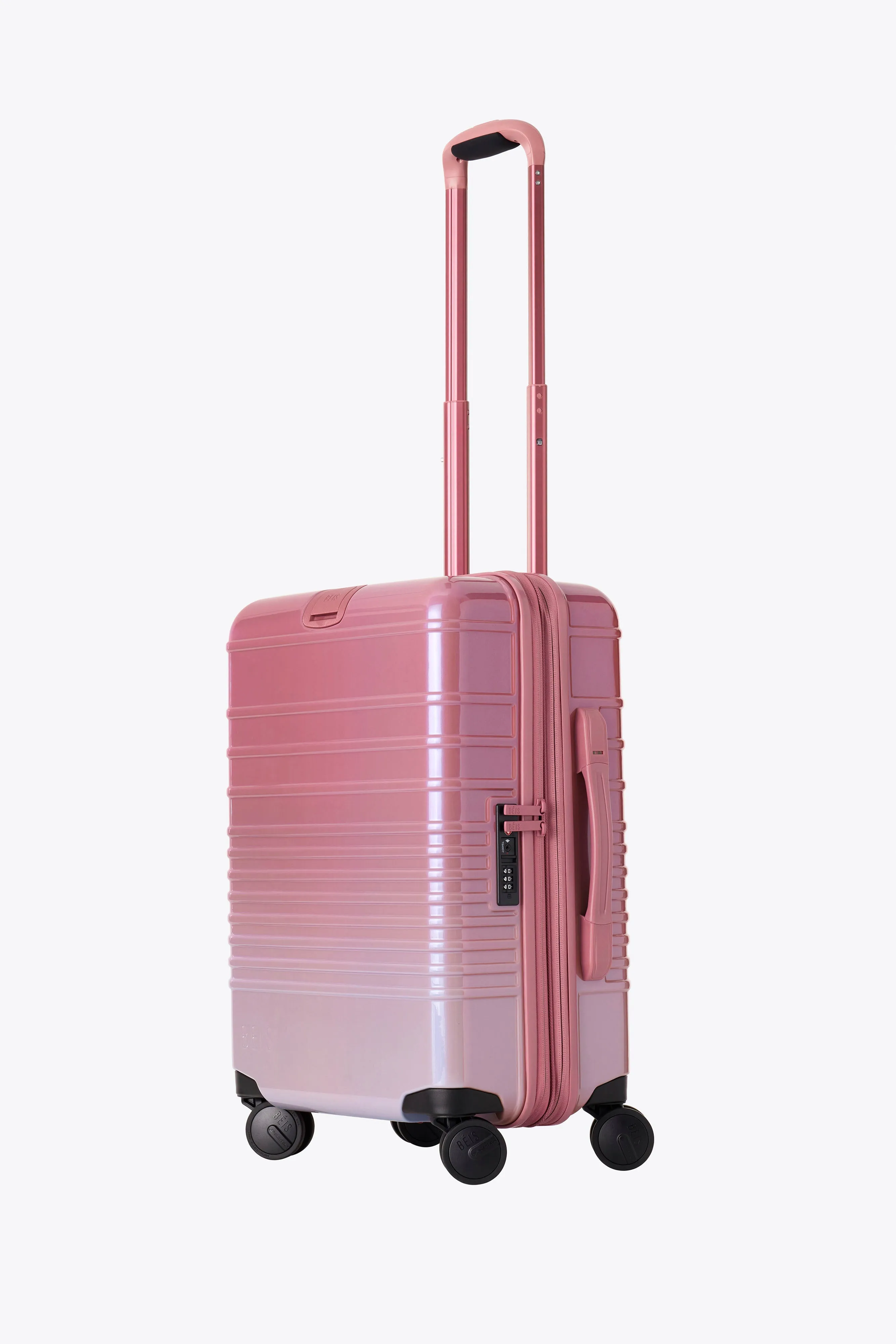 The Carry-On Roller in Wicked Pink